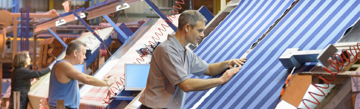 Employees at work in a textile factory.